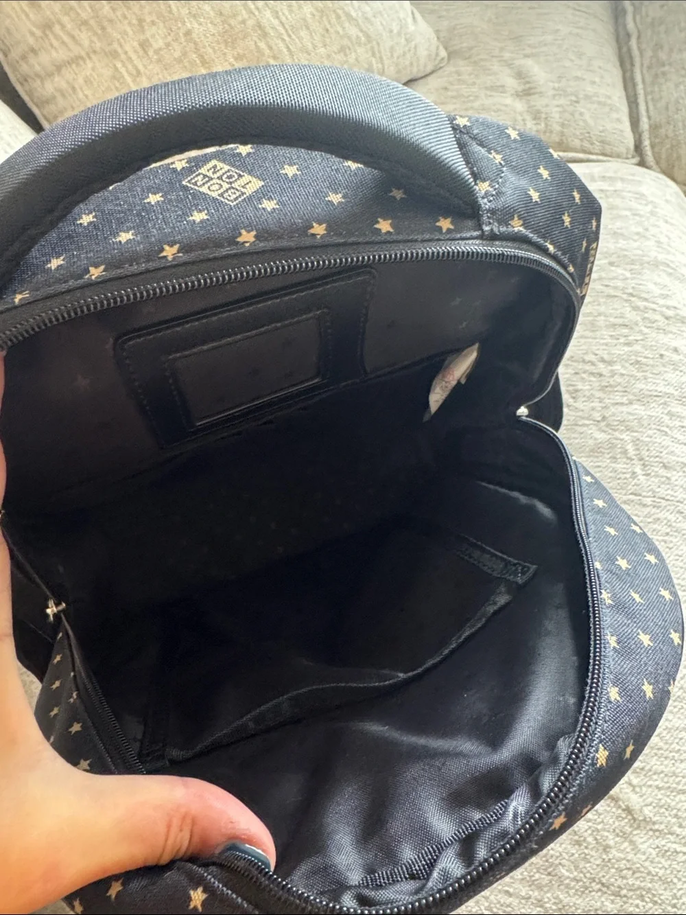 Bonton Black Backpack with Gold Star Print and Gold Trim